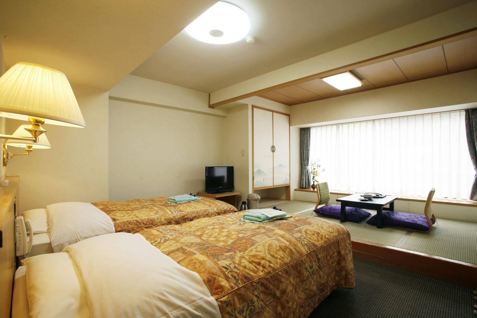 Sounkyo Kankou Hotel Kamikawa  Buitenkant foto
